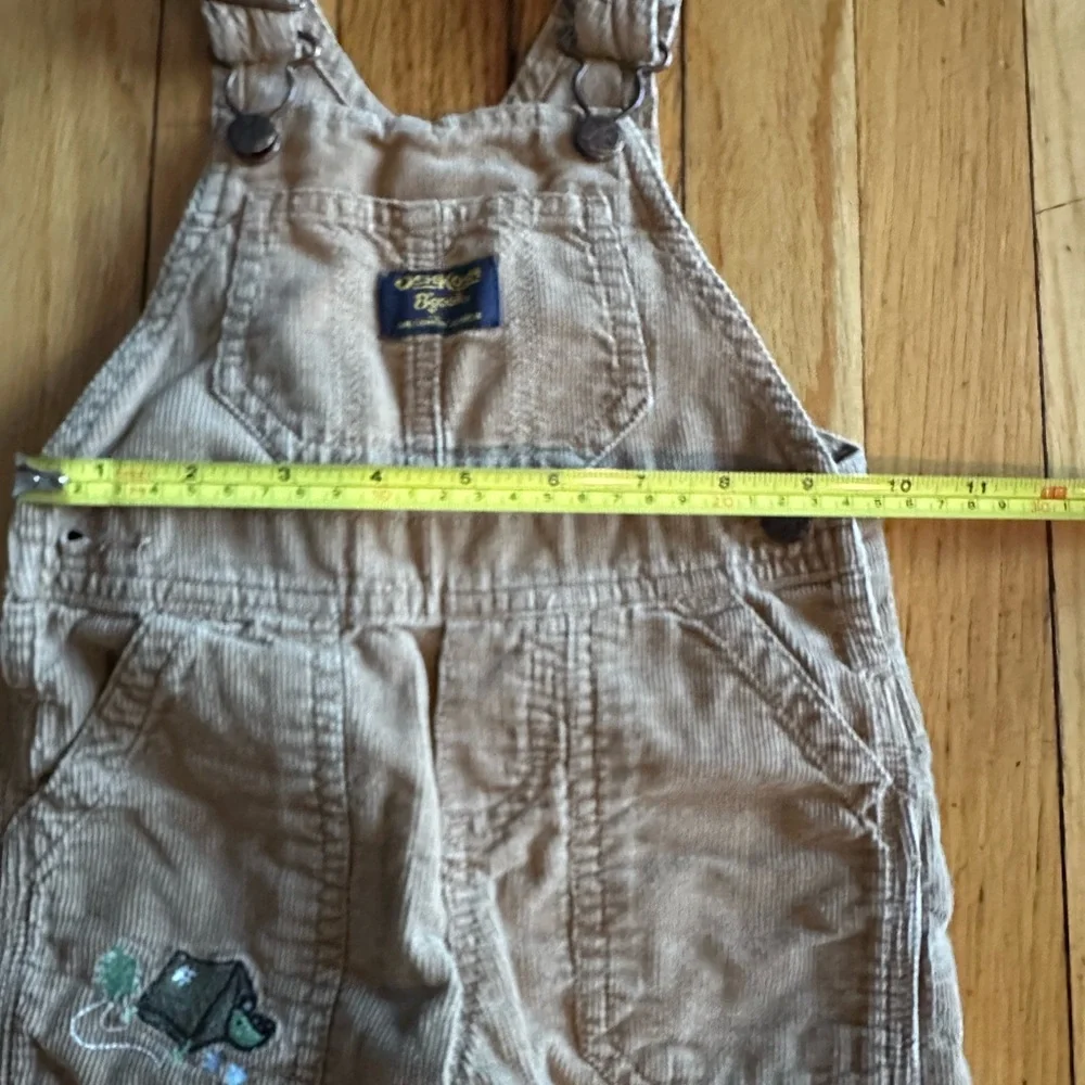 Oshkosh B’gosh Boy’s Size 12M  Tan Overalls w Dinosaurs Embroidery